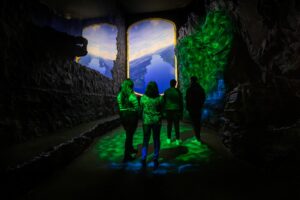 Group of friends discovering The Loch Ness Centre in Drumnadrochit