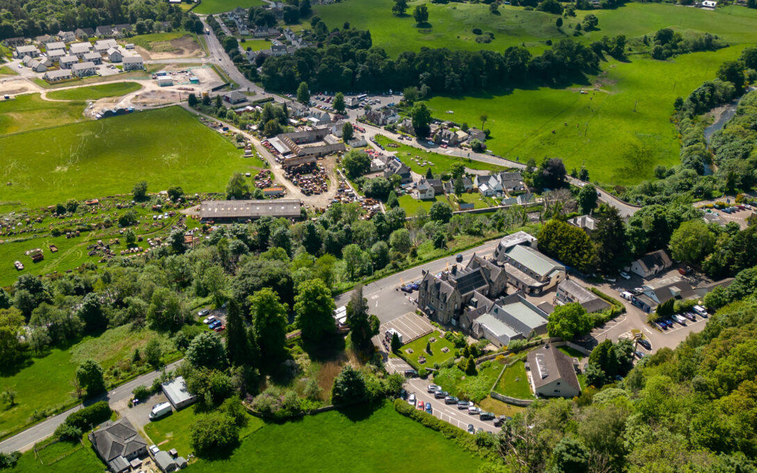 Drone picture of The Loch Ness Centre and Drumnadrochit