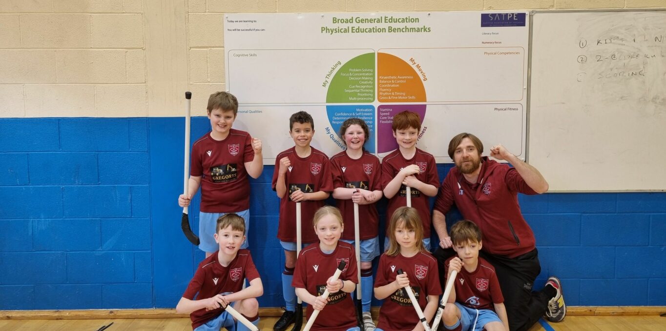 Kids shinty game at Inverness Leisure