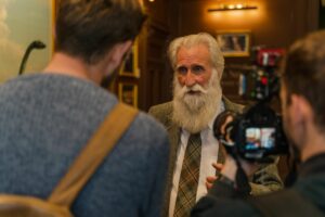 Adrian Shine in The Loch Ness Centre talking to the press