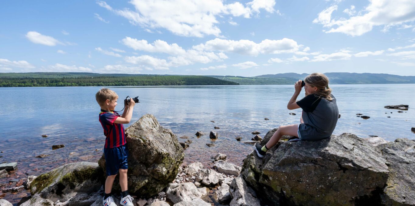 Kids looking for Nessie at Loch Ness during The Quest