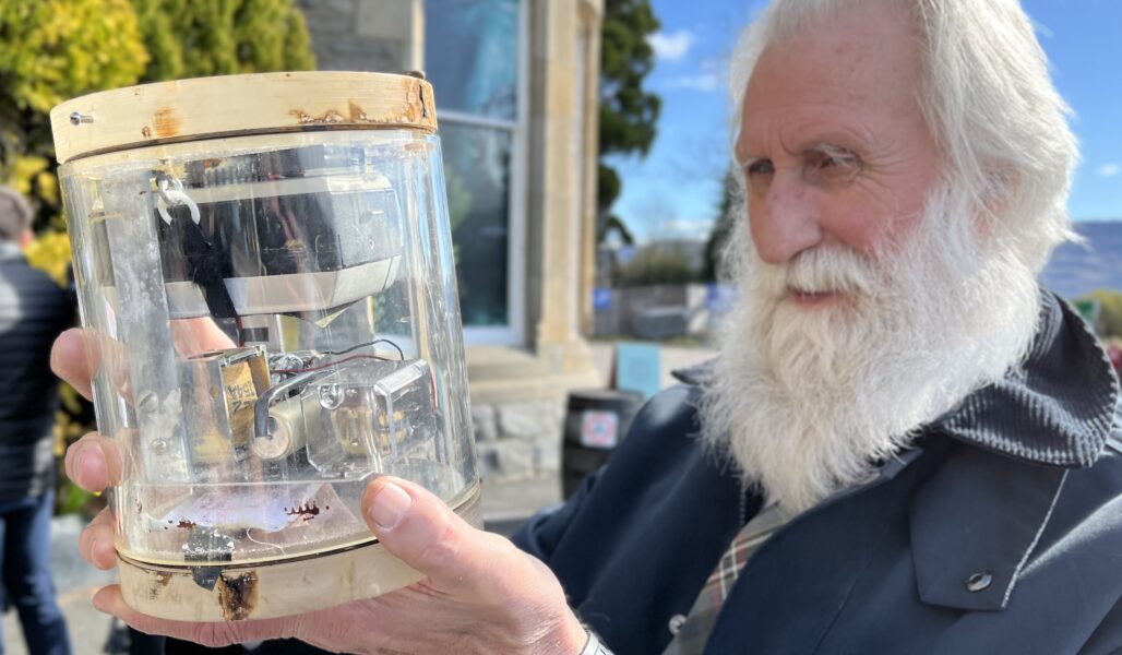 Adrian Shine with the vintage camera outside The Loch Ness Centre