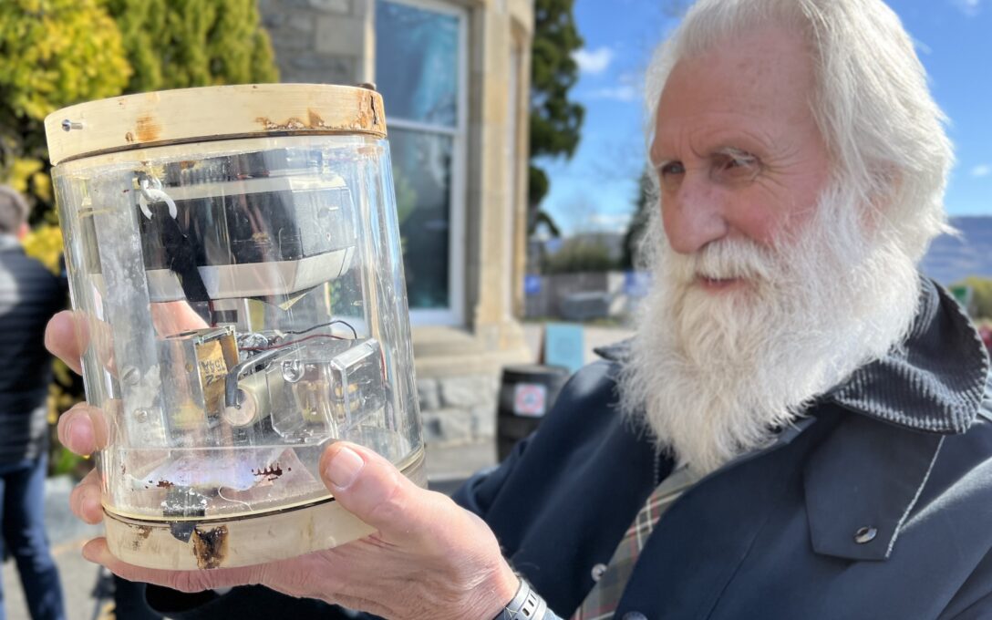 Adrian Shine with the vintage camera outside The Loch Ness Centre