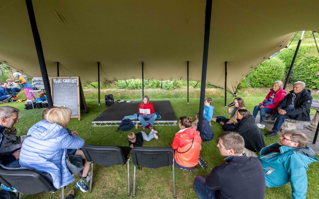 Alison reading the short stories on Loch Ness at The Quest Weekend