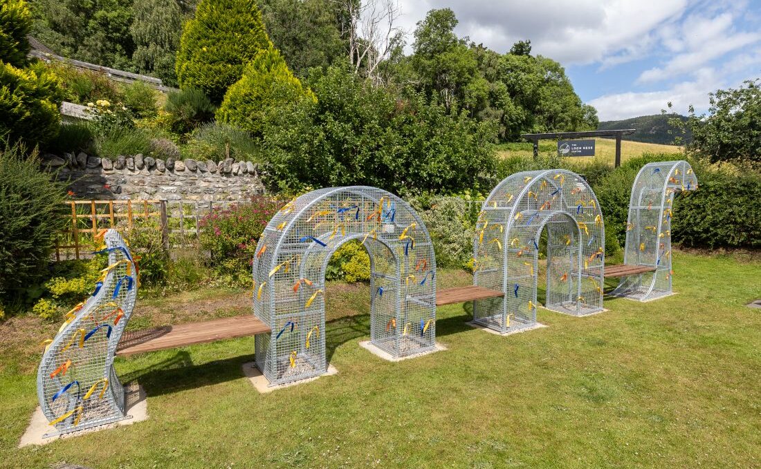 New Loch Ness Monster statue on the lawn next to The Loch Ness Centre