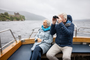 A couple looking for the Loch Ness Monster onboard our Deepscan Vessel